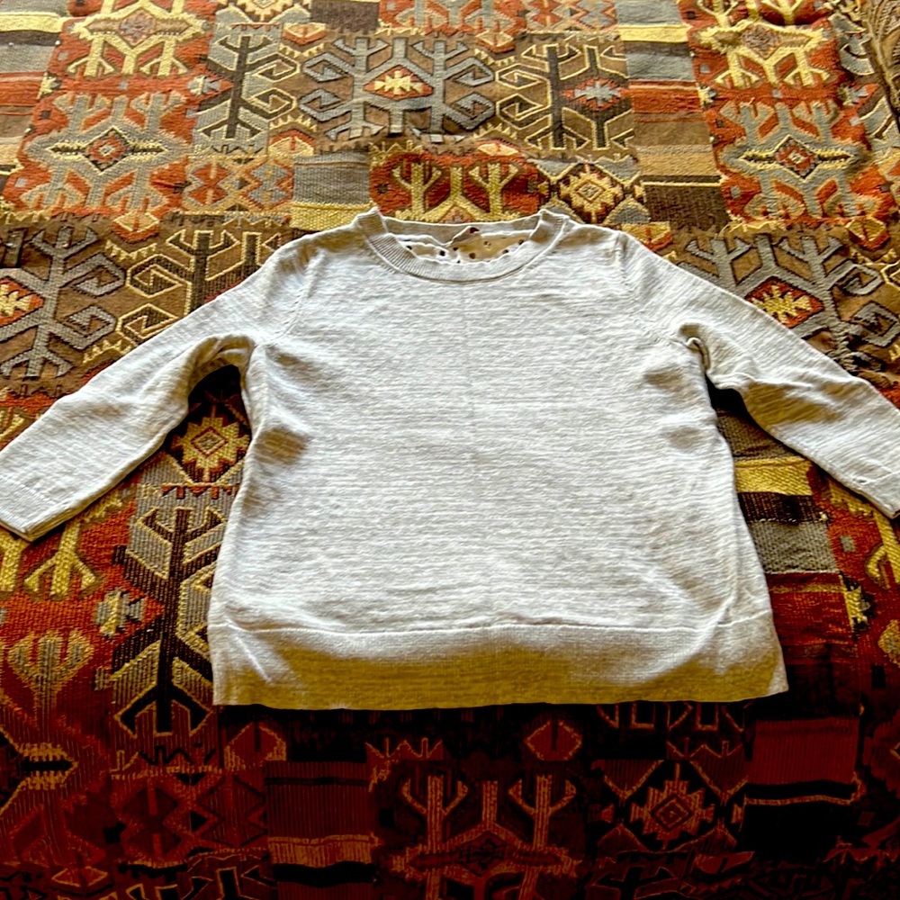 Cute silver/gray sweater with 3/4 sleeves.